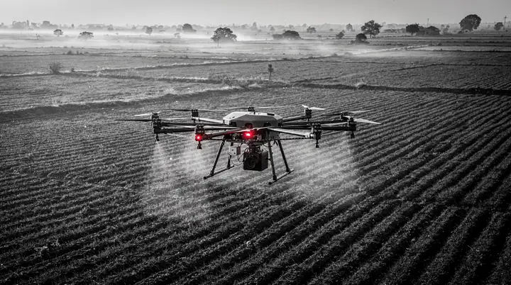 agricultural spraying drone flying low over farmland at dawn